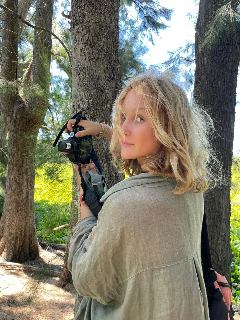 a photographer woman with canon camera