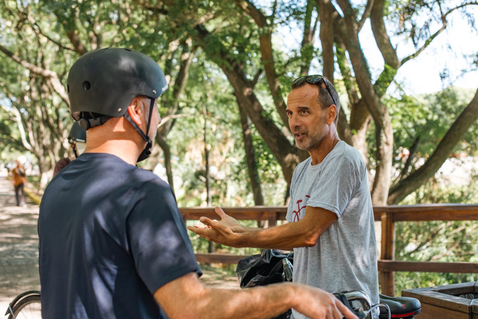 A person is talking during the bike tour