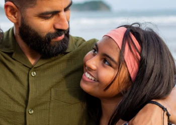Family portrait by the ocean in Nosara