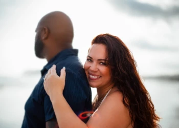 Couple enjoying a sunset on a beach in Costa Rica